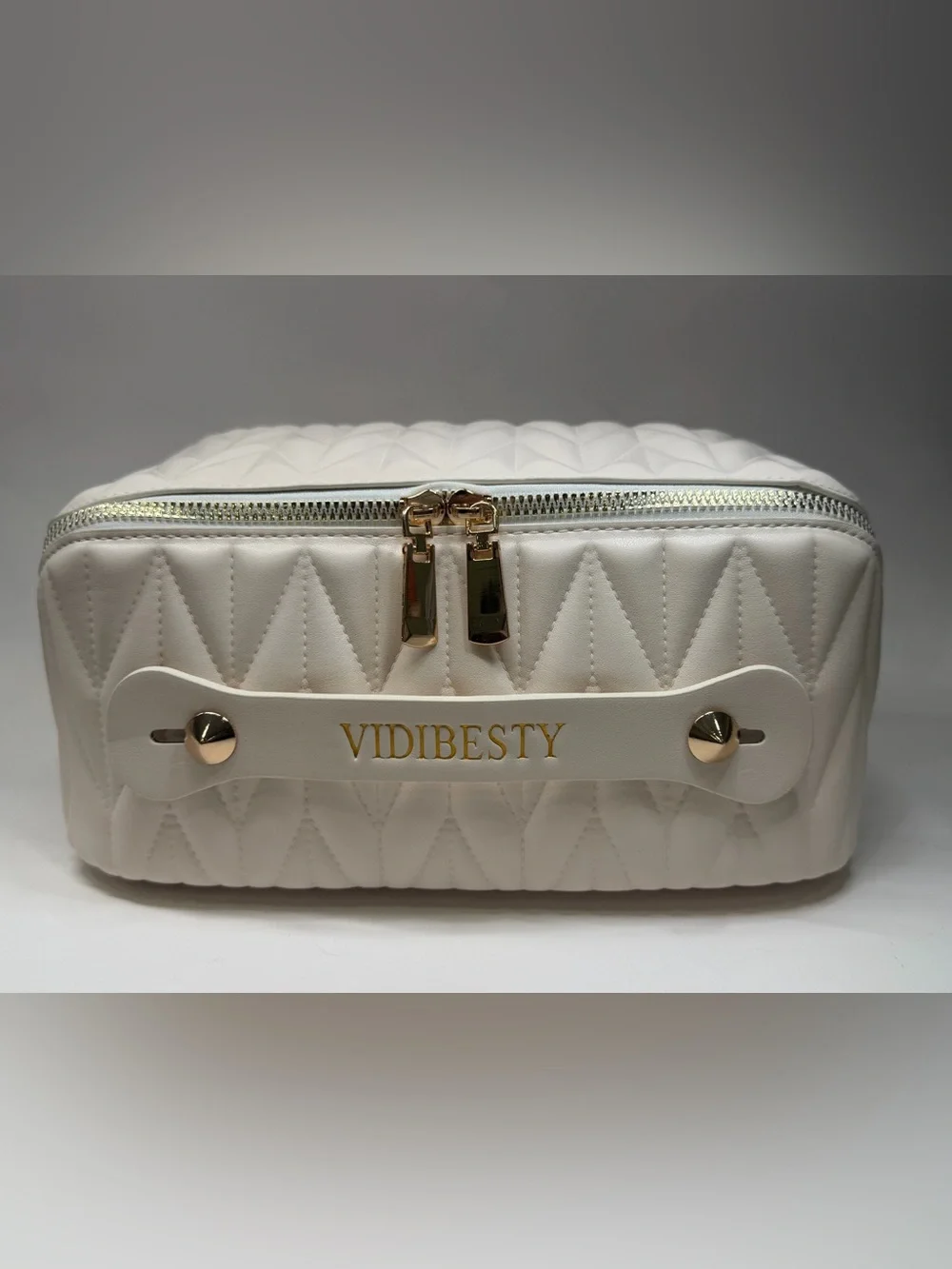 White Quilted Cosmetic Case with Gold Accents